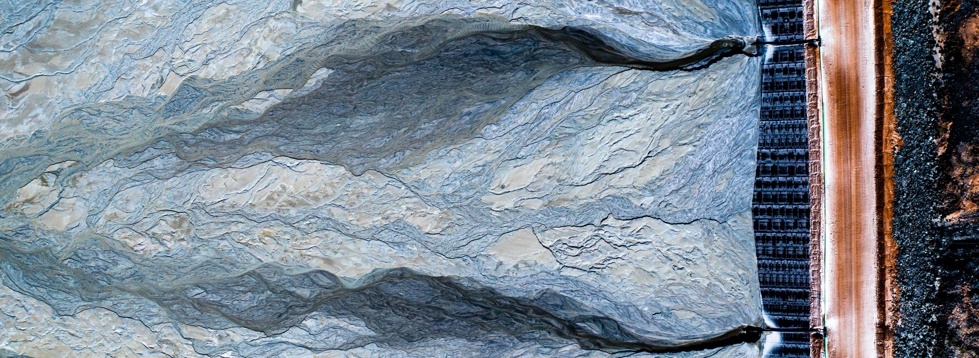 banner-insight-david-solans-img-open-cut-mining-tailings-dam