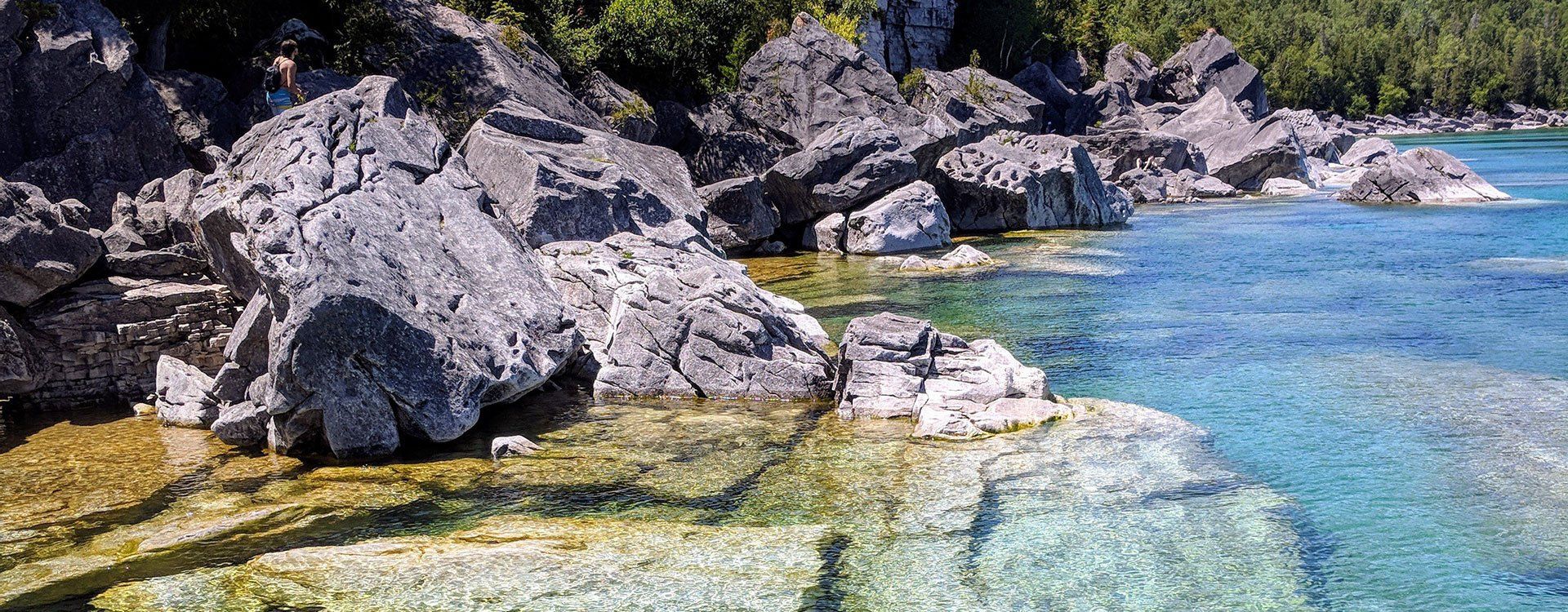 bnr-clear-lake-water-by-escarpment-cliffs