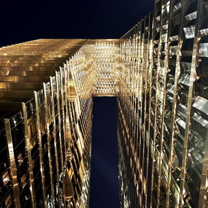 Looking up at the tower illuminated against the sky by our light design team