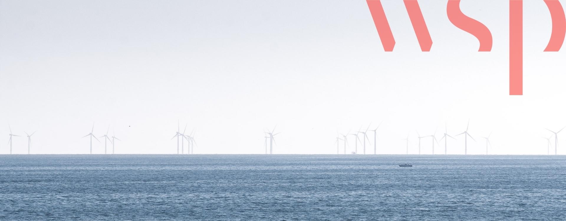 Offshore wind farm, on a clear day. WSP red logo in the top-right corner