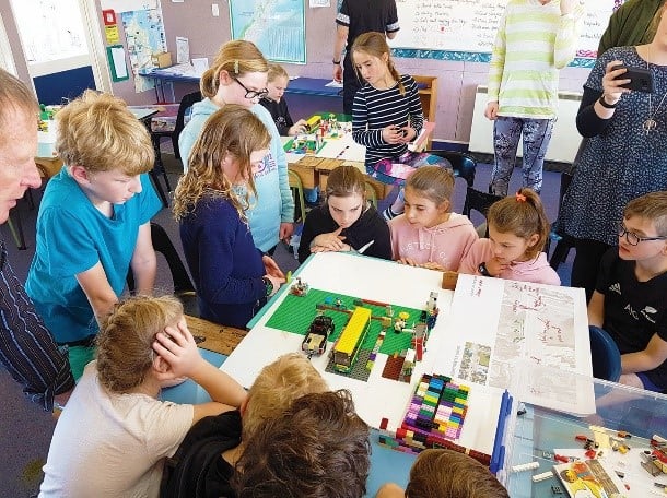 Primary school students having a discussion