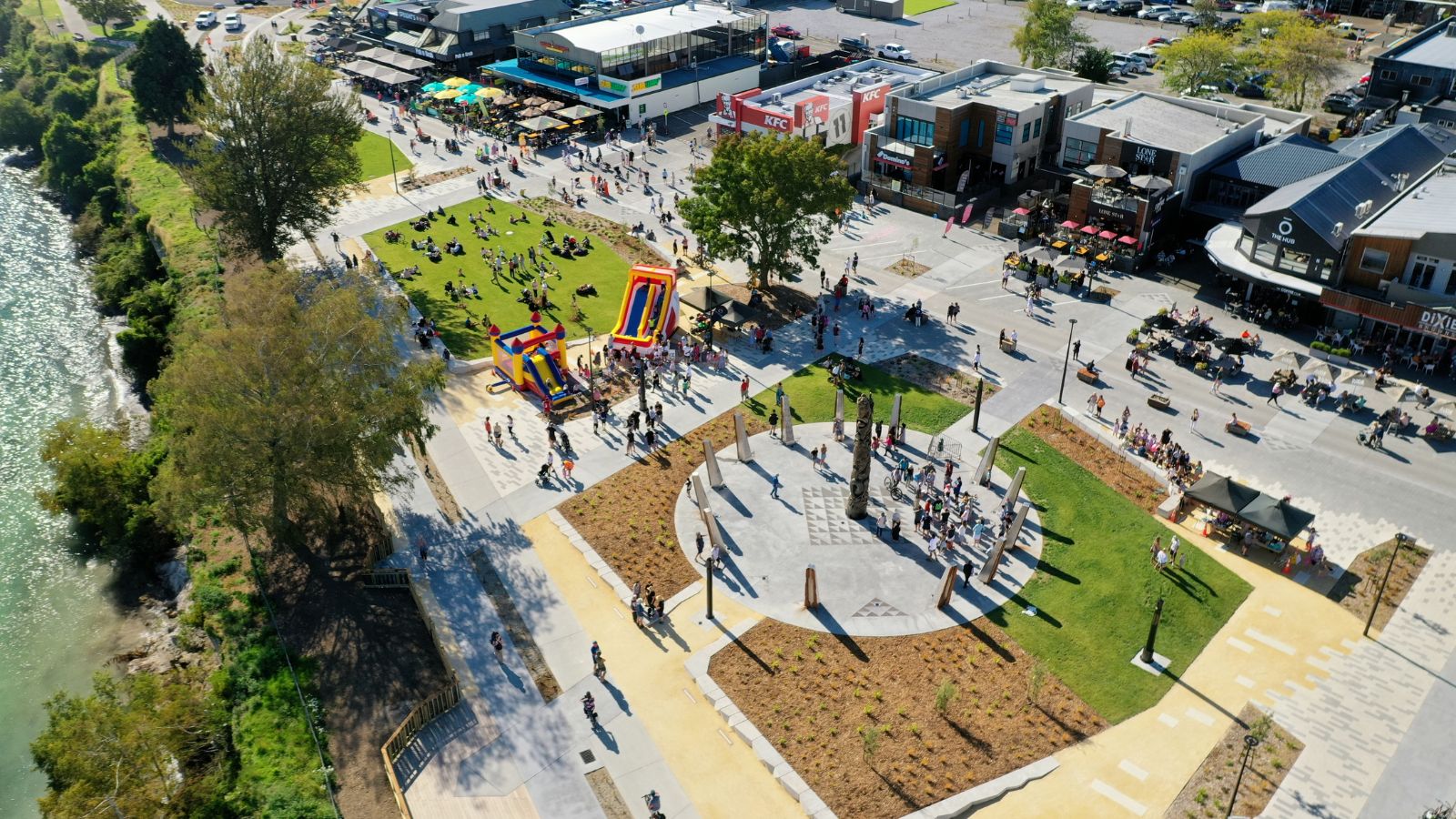 People gathering around Pou in Taupo Town Centre