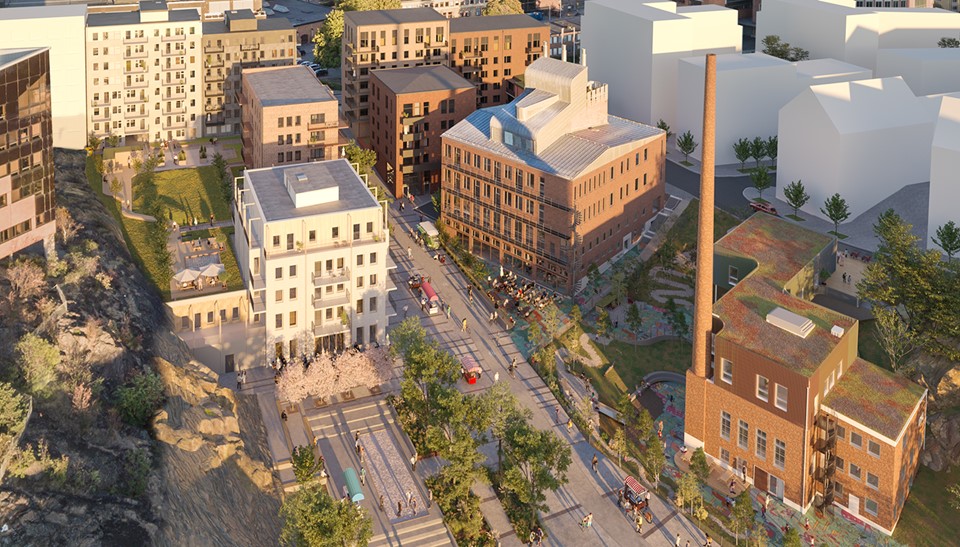 Flera flerfamiljshus som integrerats med fabrik- och industribyggnader.