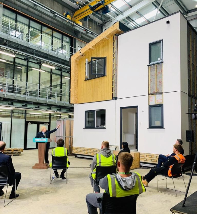 Boris Johnson infront of Floodsafe House V1 Dudley College