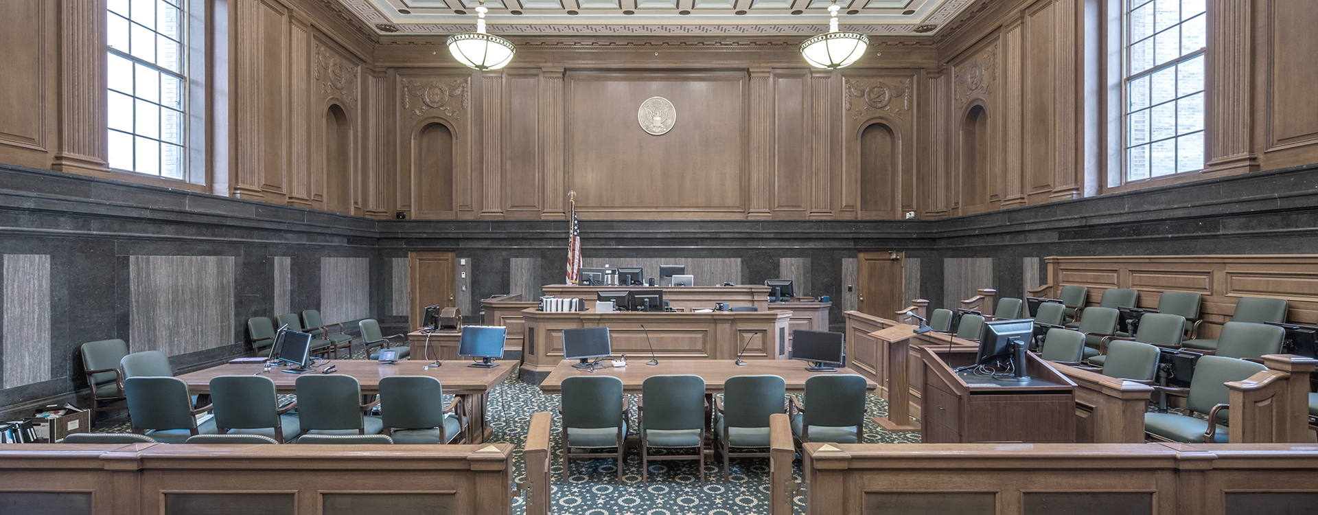 Interior view of  large wooden courtroom in Thurgood Marshall Courthouse in Manhattan