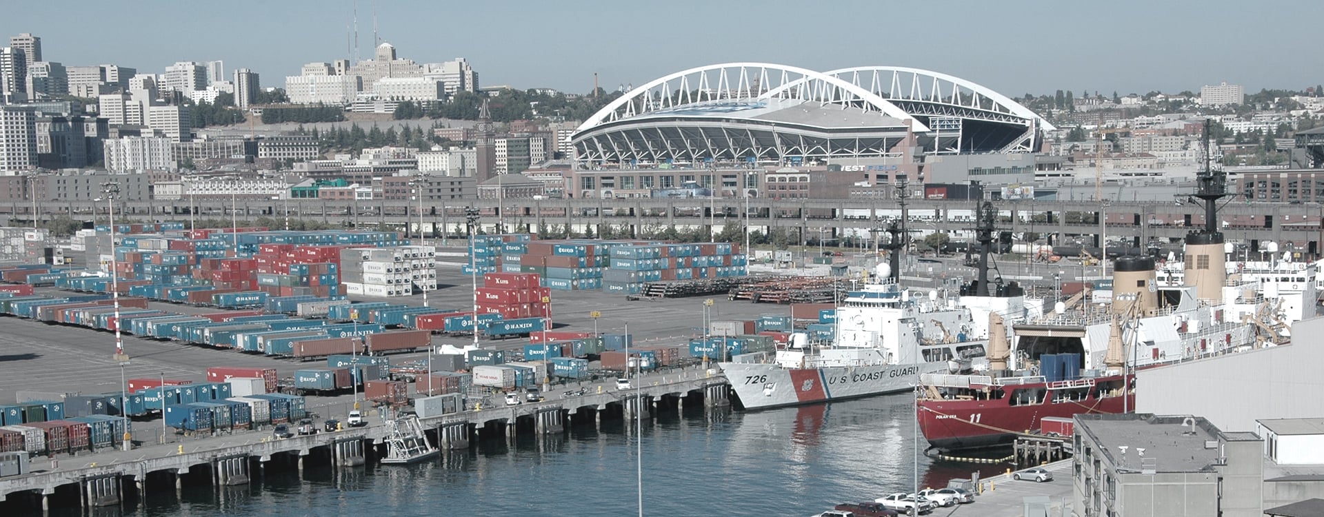 Daytime view of Pier 36 Berth Alpha with sunny Seattle day in the background 