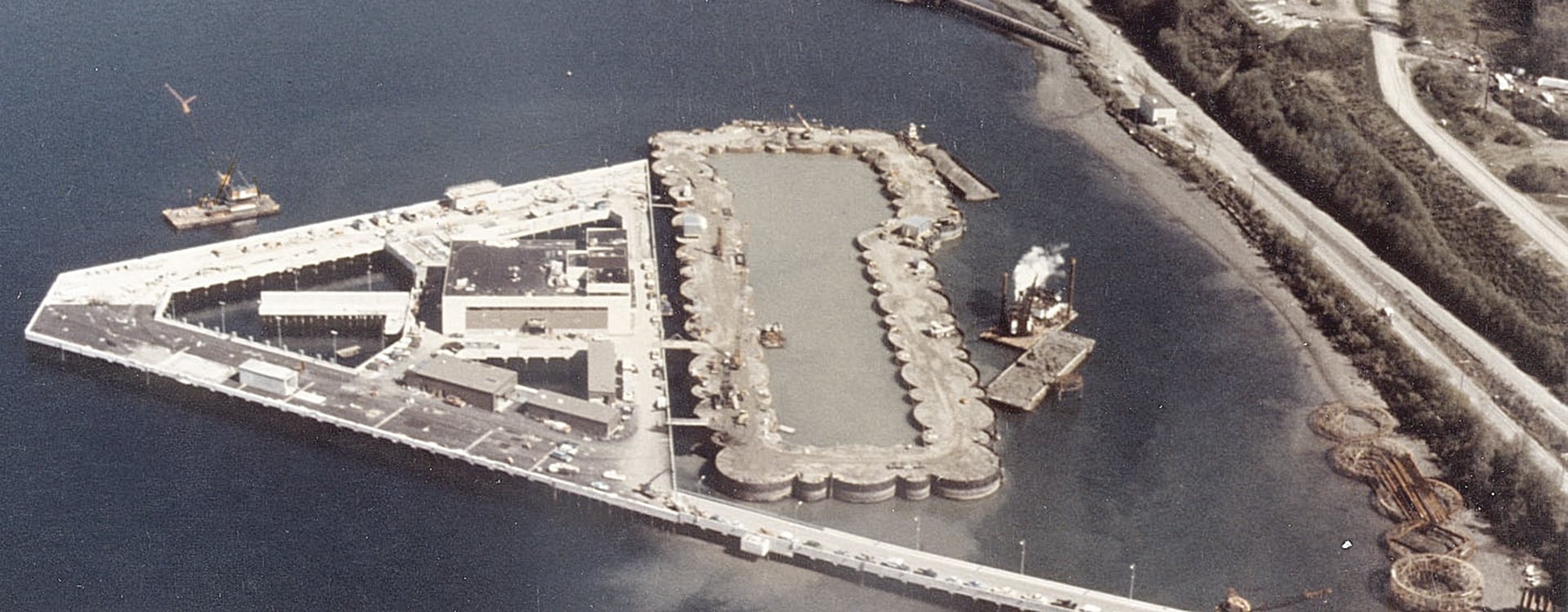 Aerial view of the triangular-shaped submarine berthing facilities in Bangor, WA