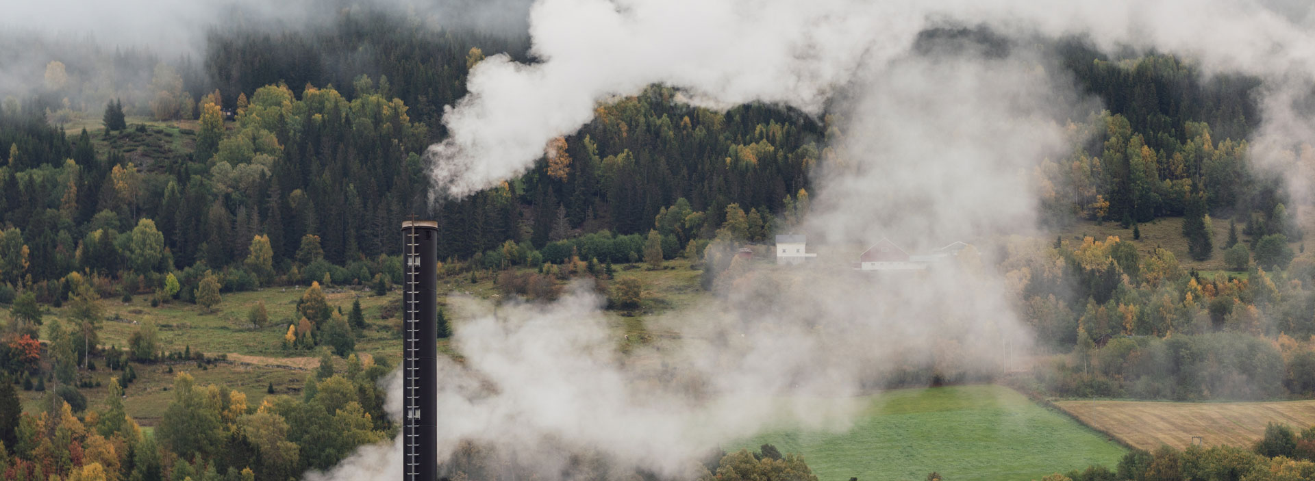 Smoke from factory chimney. Pollution and carbon capture technology concept - Banner size