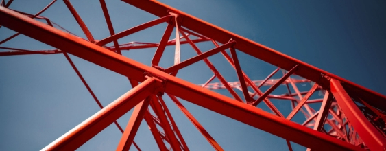 red-metal-structure-against-blue-sky-background updated